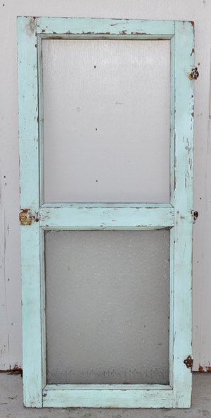 Antique door with half glass.