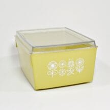 Vintage kitchen storage box in harvest gold with raised white flowers