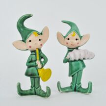 Two elf figurines playing instruments