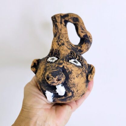 Small studio pottery ugly face jug