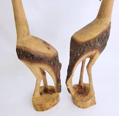 Pair of rustic, hand carved cranes, 14" tall. Carved from a single pine limb.