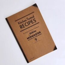 1989 reproduction of the Sunbeam Mixmaster cookbook, Kitchen Tested Recipes by the home economists of the Famous Sunbeam Mixmaster The King Of Food Mixers.