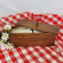Vintage recipe box full of vintage recipes. Long, wood box with divided center.