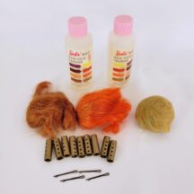 Vintage Barbie doll hair accessories from the 1960s. Wigs, empty Color bottles, rollers and bobby pins