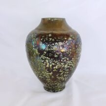 Large raku pottery urn shaped vase by Jerry and Lois Gress Neal. Iridescent earth tone colors.
