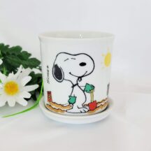 Snoopy collectible - Snoopy and Woodstock Flower pot and saucer. Woodstock is really into flowers