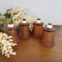 Amber votive cups in hobnail pattern. Made in the 1970s for Homco.