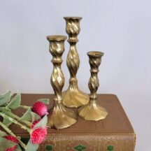 Set of 3 small brass candle holders, swir design.
