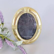1970s oval brass frame