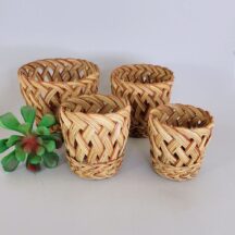 Vintage 1960s-70s pine needle baskets handmade in the Philippines. 4 graduating sizes