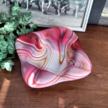 Imperial glass end of day ashtray. Pink swirls.