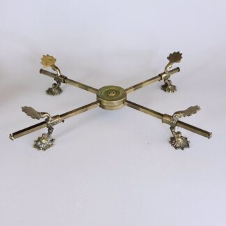 Vintage brass expanding trivet. Ornate feet