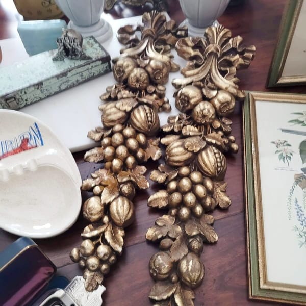 Gold Florentine wall hangings found at an estate sale